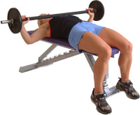 smoothly lower the bar down to your chest