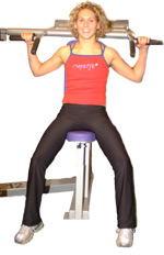 sit comfortably on the machine - having your palms facing forward