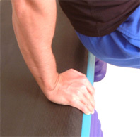 keep fingers facing forward, palms on bench